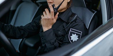 female officer in vehicle